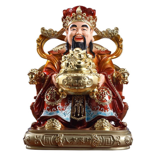 A household Buddhist statue of the God of Wealth for worship to attract wealth